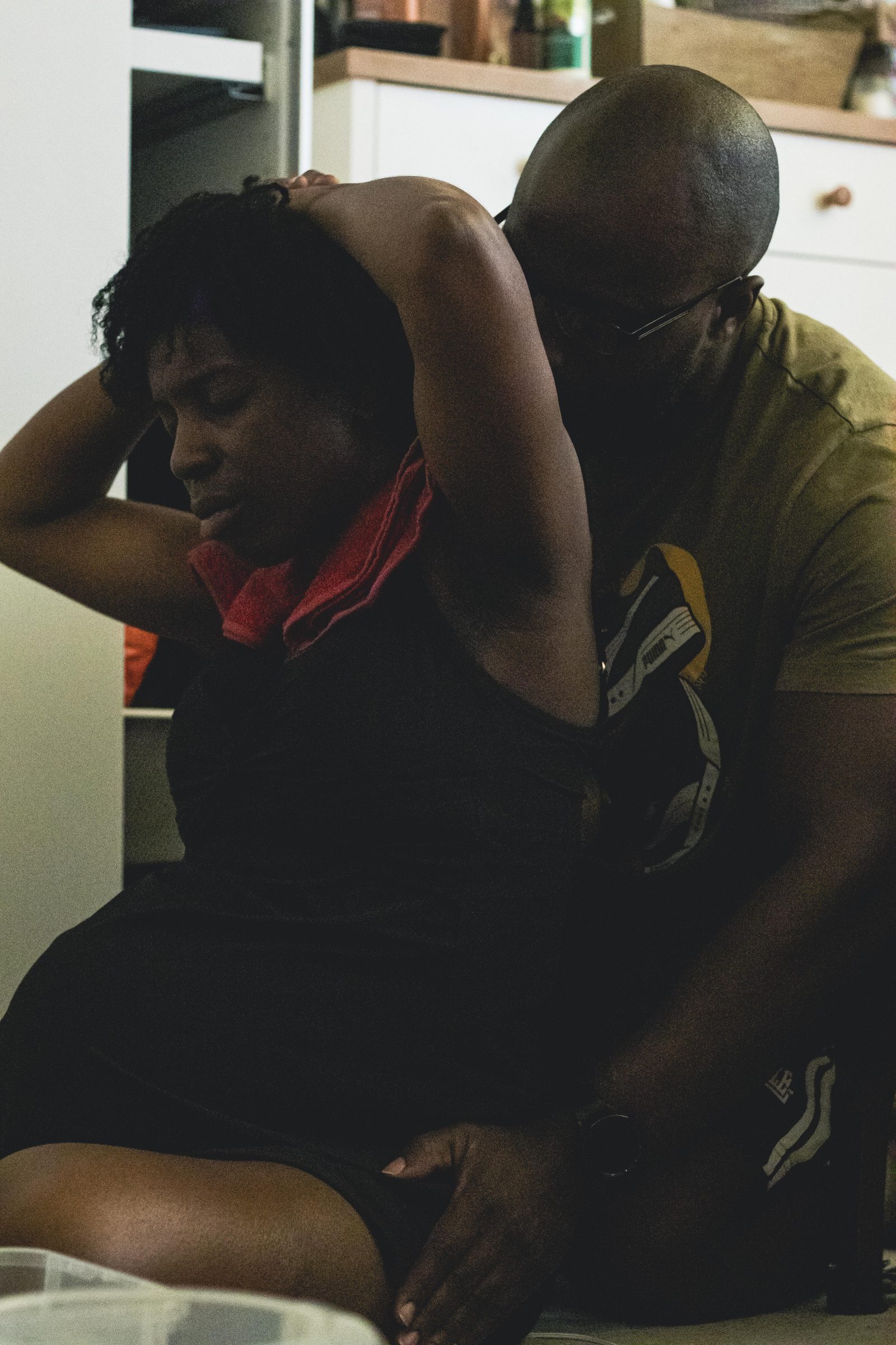Amifa in labour, supported by her husband